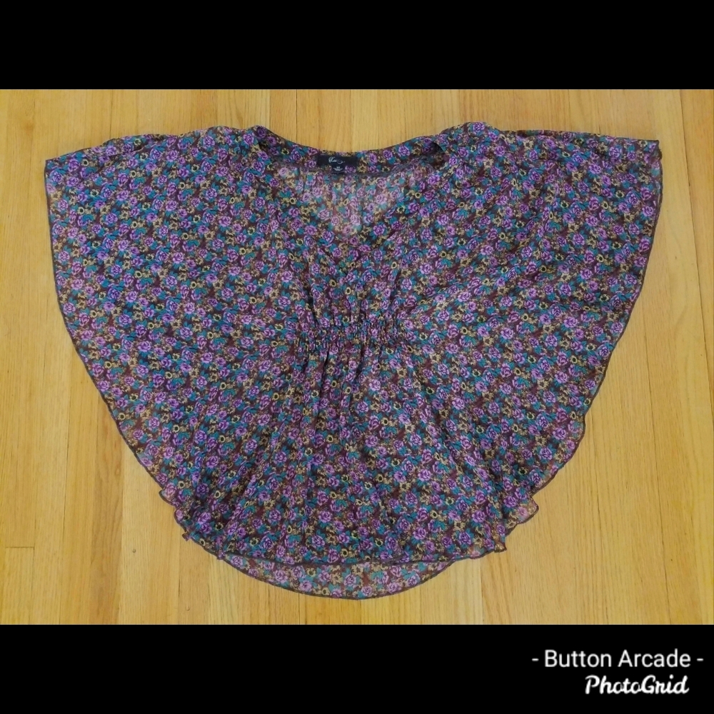 Butterfly sleeve sheer floral top.